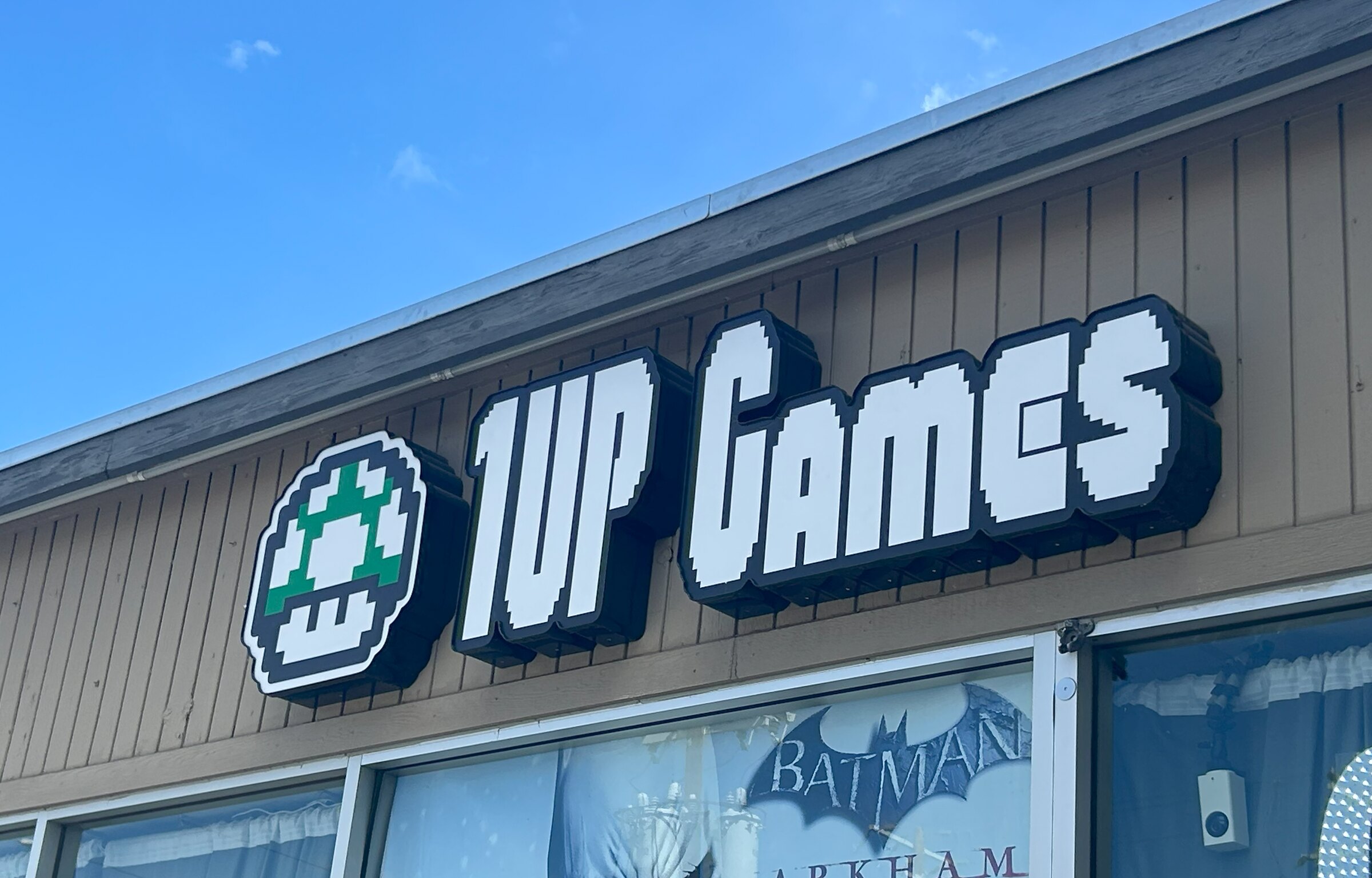 1UP Games illuminated sign